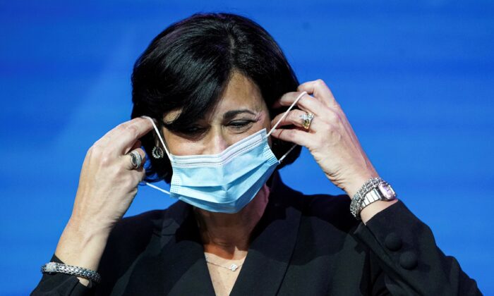 FILE PHOTO: Dr. Rochelle Walensky, now director of the U.S. Centers for Disease Control and Prevention (CDC), removes her mask to speak as Joe Biden announces nominees and appointees to serve on his health and coronavirus response teams during a news conference at his transition headquarters in Wilmington, Delaware, U.S., December 8, 2020. REUTERS/Kevin Lamarque/File Photo
